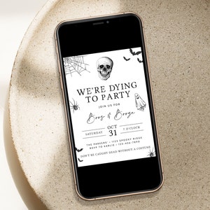 May include: Black and white Halloween party invitation with a skull, spider, ghost, and bats. The text reads "We're Dying to Party" and includes the date, time, and location of the party.
