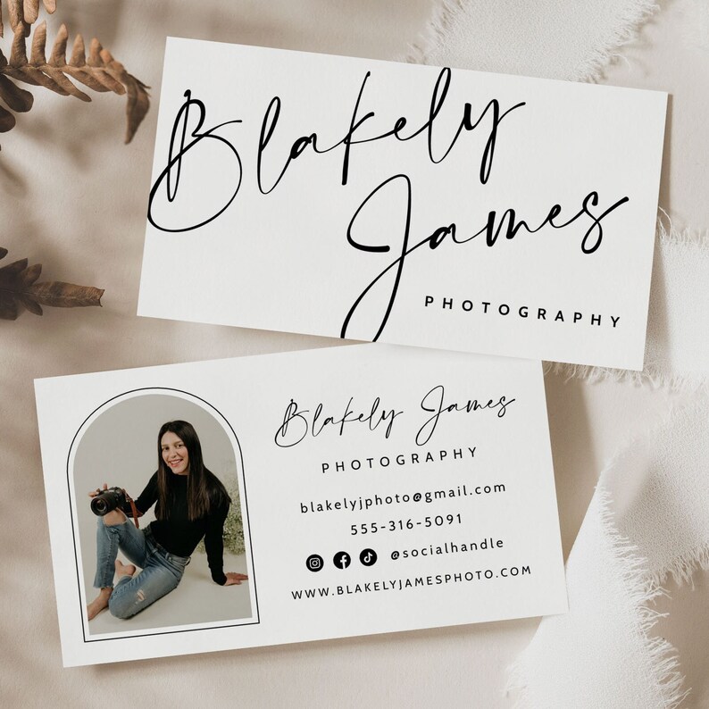 May include: White business card with black text. The text reads "Blakely James Photography" and includes a website address, email address, phone number, and social media handles.