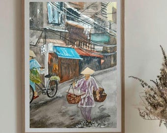 May include: Watercolor painting of a street scene in a city. The painting depicts a woman wearing a conical hat carrying baskets on a stick. The woman is walking down a street lined with buildings. The street is wet from rain and there are puddles on the ground.