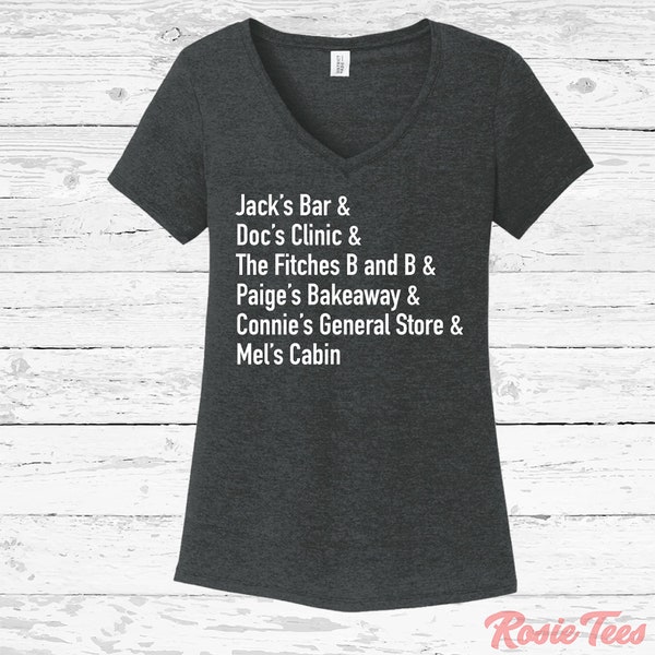Jack's Bar & Doc's Clinic V-Neck Tee | As Seen On TV Women's T-Shirt | Romance Novel Apparel | Mel's Riverware Ladies Shirt | Rosie Tees