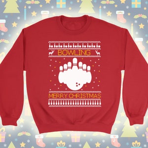 May include: Red Christmas sweater with a white bowling pin and ball design. The sweater has the text "Bowling" and "Merry Christmas" in yellow.