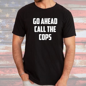 Camiseta "Adelante, llama a la policía": divertida camiseta con gráficos policiales