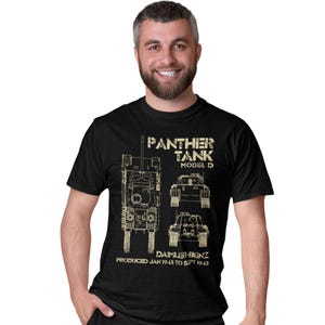 May include: Black t-shirt with a light tan diagram of a Panther Tank Model D. The diagram includes the text "PANTHER TANK MODEL D" and "PRODUCED JAN 1943 TO SEPT 1943". The shirt is worn by a person.