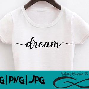 May include: White t-shirt with the word "dream" written in black cursive script. The text is centered on the shirt. The shirt is on a hanger against a white background. The text "SVG | PNG | JPG" is at the bottom of the image.