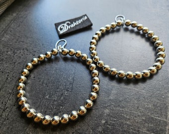 Statement pearl earrings with stainless steel ear hooks from the jewelry label DRAHTORIA