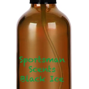 May include: Amber glass spray bottle with a black atomizer and clear cap. The bottle has the text "Sportsman Scents Black Ice" in green. The bottle is filled with a clear liquid.