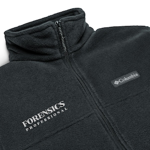 May include: A black fleece jacket with a high collar and a full-length zipper. The jacket features the Columbia logo on the right chest and the words "FORENSICS PROFESSIONAL" in white lettering on the left chest.