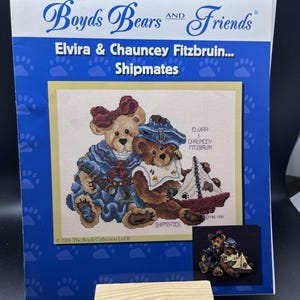 May include: A cross-stitch leaflet titled "Boyds Bears and Friends" featuring "Elvira & Chauncey Fitzbruin... Shipmates." The cover shows a cross-stitched image of two teddy bears, one in a sailor hat and the other with a bow.