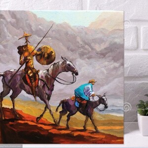 May include: A painting of two figures on horseback riding through a mountainous landscape. The figure in the foreground is wearing a blue tunic and riding a brown horse. The figure in the background is wearing a yellow tunic and riding a white horse. The painting is done in a painterly style with visible brushstrokes.