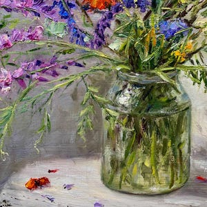May include: A vibrant still life painting of a bouquet of colorful flowers in a clear glass jar. The flowers include shades of purple, red, blue, and yellow. The jar sits on a white surface, with scattered petals.