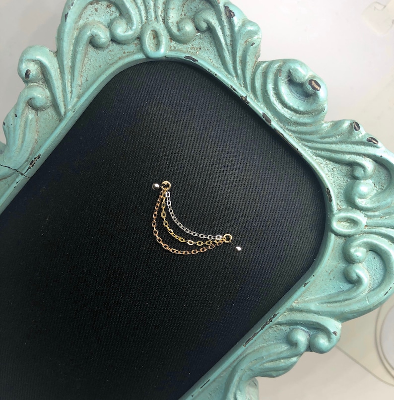 14k Mixed gold Triple hang Piercing chain.