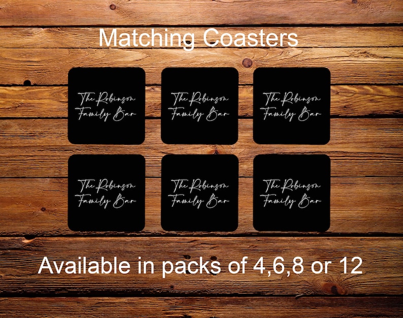 May include: Six black square coasters with white text that reads "The Robinson Family Bar". The coasters are available in packs of 4, 6, 8, or 12.