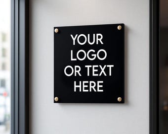 May include: A black square sign with rounded corners and gold accents. The sign says "YOUR LOGO OR TEXT HERE" in white text.