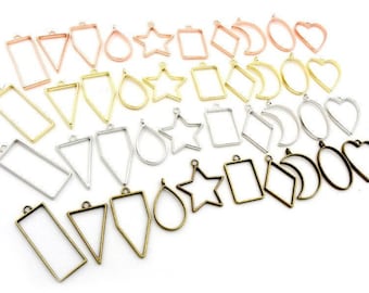 10pcs 30pcs 4 Couleur Géométrique creux Blanc Pendentif pour Bijoux Fabrication Plateau Lunette Charmes Bricolage Moule lunette fait main