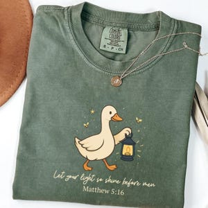 Cute Bible Verse Tee, Christian Comfort Colors Shirt, Let Your Light Tee, Matthew 5:16 Lantern Goose Shirt, Faith Aesthetic Christian Gift