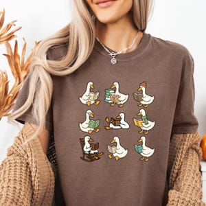 Cute Goose Reading Shirt, Book Lover Tee, Funny Goose Shirt, Cozy Reading Gift, Teacher Librarian Book Club Shirt, Reader Graphic Tee