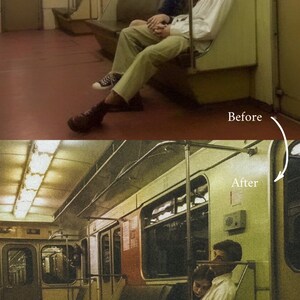 May include: A couple sits on a subway train, holding hands. The man is wearing a white shirt and khaki pants, while the woman is wearing a dark shirt and jeans. The train is empty except for them.