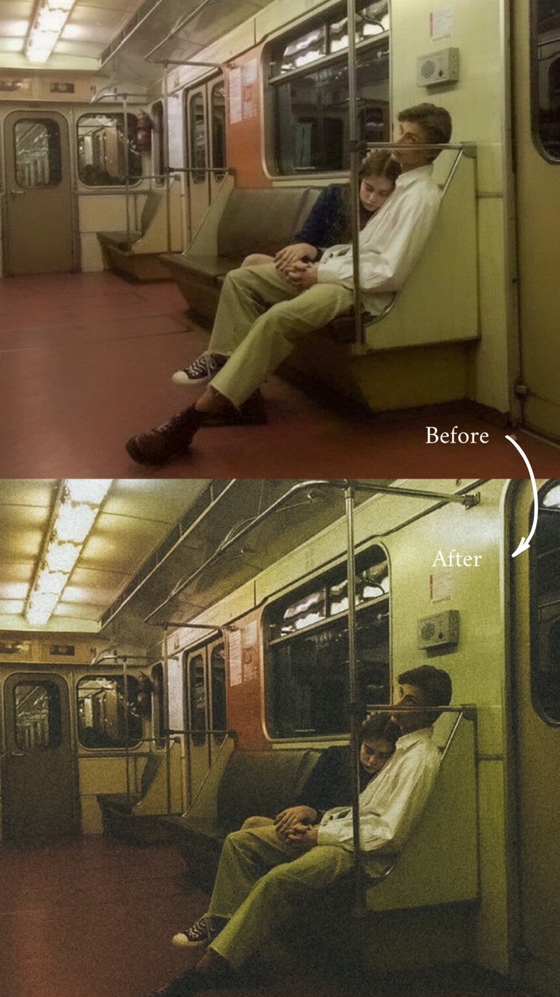 May include: A couple sits on a subway train, holding hands. The man is wearing a white shirt and khaki pants, while the woman is wearing a dark shirt and jeans. The train is empty except for them.