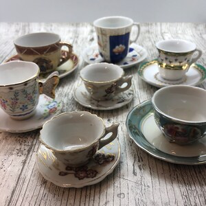 Vintage Miniature teapot cups and saucers  small decorative floral gold detail