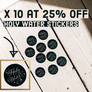 May include: Ten black and white round stickers with the text "Holy Water" in a cursive font. The stickers are arranged in a circle on a white wooden surface. The text "X 10 AT 25% OFF HOLY WATER STICKERS" is at the top of the image.