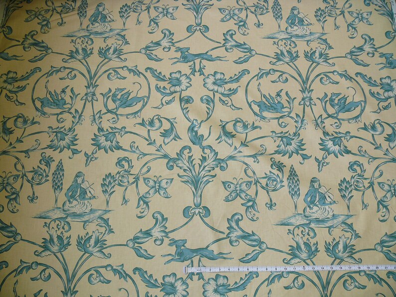 May include: A yellow fabric with a repeating pattern of blue floral designs, butterflies, and figures playing musical instruments.