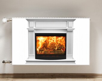 May include: White radiator cover with a faux fireplace design. The fireplace has a black frame and a realistic image of a fire burning inside.