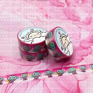 May include: Pink decorative washi tape rolls with a repeating pattern of smiling gumball machines and a sun in a cloud. The tape rolls have the text "www.rebeccajanesstickersetsy.com".