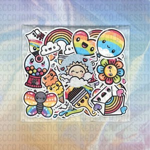 May include: A sheet of colorful stickers featuring cute cartoon characters with rainbow accents. The stickers include a butterfly, a sun, a paintbrush, a gumball machine, a heart, a rainbow, and a flower.