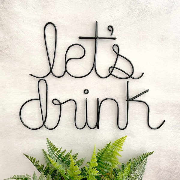 Letrero metálico "Let's Drink": Decoración para bares en casa y cuevas de hombre.