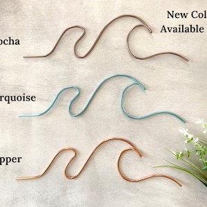 May include: Three wire wave sculptures in different colors: mocha, turquoise, and copper.  New Colors Available Now!