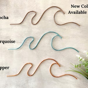 May include: Three wire wave sculptures in different colors: mocha, turquoise, and copper.  New Colors Available Now!