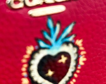 Cartera personalizada pintada a mano con girasoles y el Sagrado Corazón.