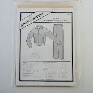May include: A vintage sewing pattern for a men's Chinook running suit. The pattern includes illustrations of a jacket and pants, along with fabric and measurement details. The Green Pepper Inc. logo is visible.