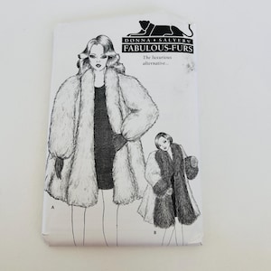 May include: A white sewing pattern envelope for Donna Salyers' Fabulous-Furs featuring black ink illustrations of two coat styles labeled A and B. The text reads Donna Salyers' Fabulous-Furs and The luxurious alternative with a panther logo.