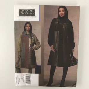May include: A Koos Couture Vogue Patterns American Designer sewing pattern envelope V1146. The front displays two variations of a long-sleeved, button-front coat or dress with patchwork panels in shades of black, brown, and olive green.