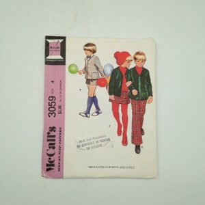 May include: A vintage McCall's sewing pattern for separates for boys and girls. The pattern number is 3059, size 4. The pattern is $1.00 and $1.10 in Canada. The pattern features a boy and girl wearing plaid pants and a jacket.