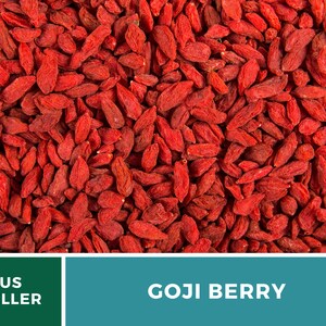 May include: Close-up of dried goji berries, showcasing their vibrant red color and elongated shape. The image is filled with the berries, creating a textured, natural pattern. The text "GOJI BERRY" is displayed in a white font on a teal background.