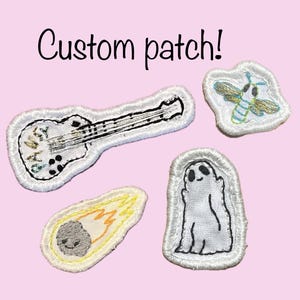 May include: Four embroidered patches with white borders. One patch is a white guitar with black details, one is a blue and gold bee, one is a grey smiling comet with yellow flames, and one is a white ghost. The text Custom patch! is at the top.