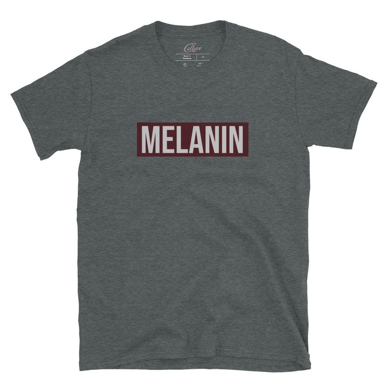 May include: A dark heather grey t-shirt with a maroon rectangle featuring the word "MELANIN" in white text.