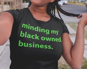 Minding my black owned business Unisex T-Shirt