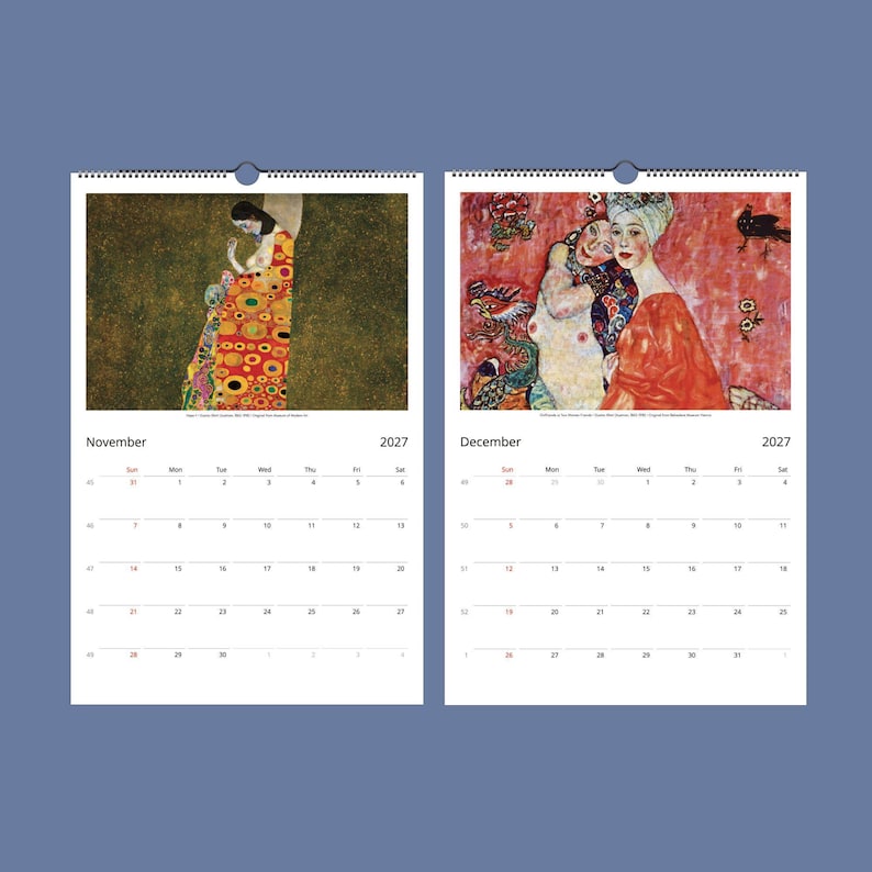 Two open calendar pages for November and December 2027, displaying Klimt's "Hope II" and "The Dancer" paintings above the dates.