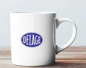 Regalos para amantes de los coches: taza de café de cerámica Delâge con logotipo icónico.