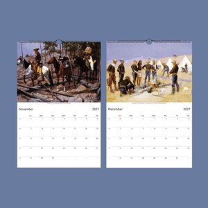 Two open calendar pages show November and December 2027; November depicts cowboys with horses in a wooded area, and December shows men gathered around a campfire in a camp.