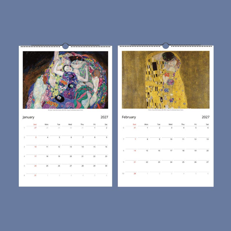 Two open calendar pages for January and February 2027, displaying Klimt's "The Kiss" and "Danaë" paintings above the dates.