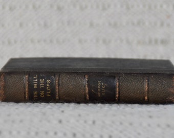 The Mill on the Floss by George Eliot - antique 1911 edition published by T Nelson & Sons - black gold gilt book dark antiquarian aesthetic