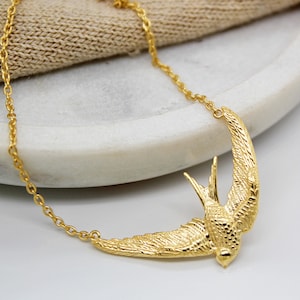 Beautiful Sterling Silver or Yellow Gold plate Swift Bird Necklaces