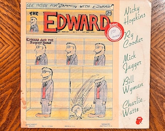 May include: Vintage vinyl record album cover for "The Edward" featuring cartoon illustrations and the names Nicky Hopkins, Ry Cooder, Mick Jagger, Bill Wyman, and Charlie Watts. The cover has a red and white sticker that says "Budget 1.50 used".