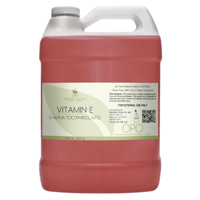 May include: A gallon jug of red liquid labeled "Vitamin E D-Alpha Tocopherol, MT50" by Organic Pure Oil. The label also states "Pure & Natural Vitamin E Oil MT50, Gluten-Free, GMO-Free, D-Alpha Tocopherol" and "For External Use Only".