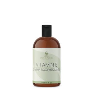 May include: A brown glass bottle with a black cap, labeled "OPO Organic Pure Oil" and "Vitamin E D-Alpha Tocopherol MT50". The bottle contains 8 ounces of vitamin E oil.