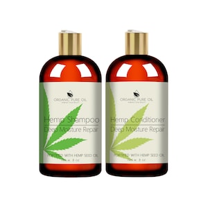 May include: Two brown bottles with gold caps and white labels. The labels have green hemp leaf designs and text that reads "Organic Pure Oil", "Hemp Shampoo Deep Moisture Repair", "Hemp Conditioner Deep Moisture Repair", "Fortified with Hemp Seed Oil", and "Net.w. 8 oz".